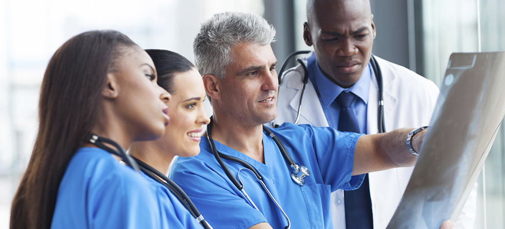 Doctors reviewing chart