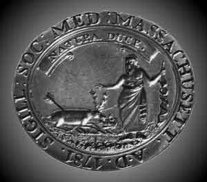 Figure of Aesculapius in his proper Habit pointing to wounded Hart nipping the Herb proper for his cure with the motto 'natura duce'