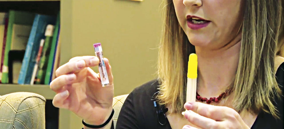 Pharmacist demonstrates Narcan