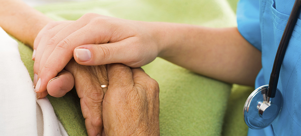 Nurse Helping Elderly