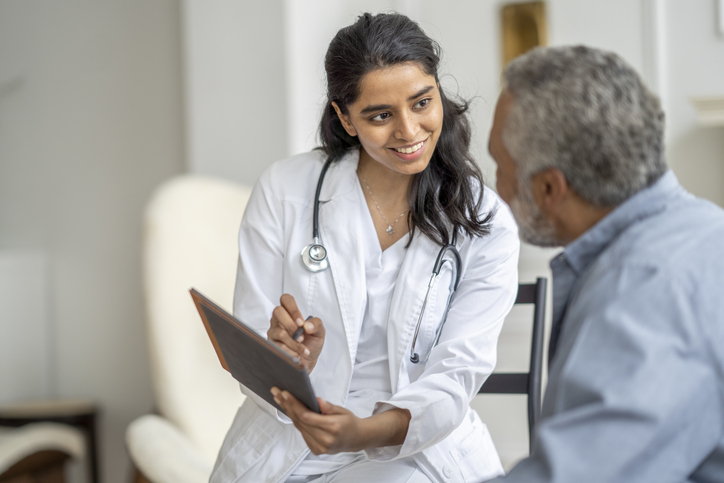 Doctor with aging patient